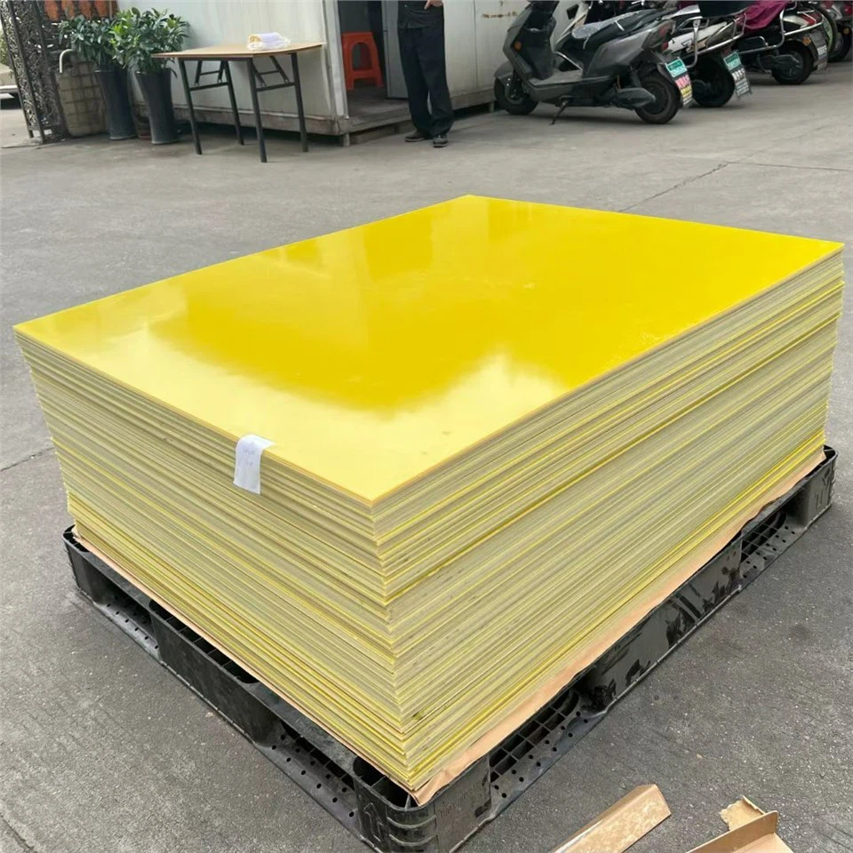 How should epoxy glass cloth laminated sheets be stored and handled?